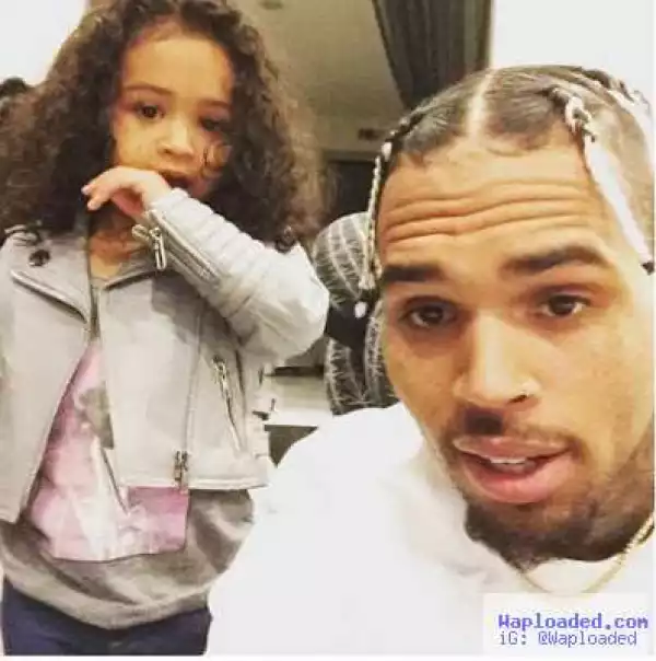 Chris Brown shows off new hairstyle as he takes a selfie with his daughter, Royalty